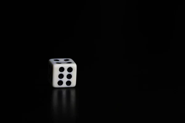 Dice on a black background.