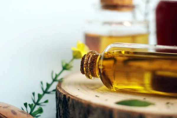 Natural Medicine: Essential oil in a glass jar.