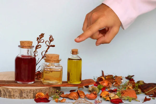 Natural Medicine: Doctor pointing out and recommending the use of the essential oil.