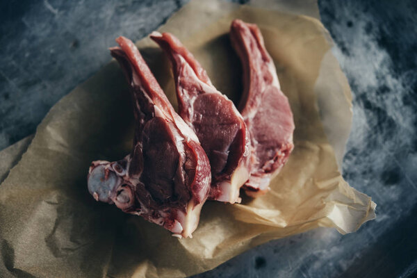 Veal chops on a craft paper