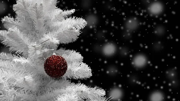 White artificial eco tree with red ball on a black background with defocus snowflakes. Christmas card background backdrop copy space, christmas holiday decoration
