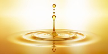 Goldener Tropfen aus Oel mit Spiegelung
