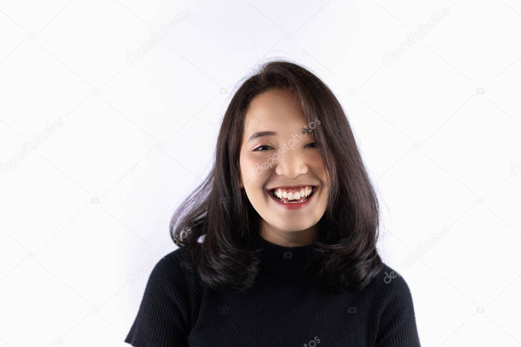 Short haired girl Wearing a black T-shirt Laughing joyfully on the White Blackground