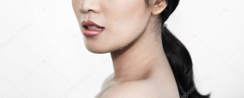 Girl's face Show facial organs and skin on a white background under the concept of beauty, cosmetic products and women.