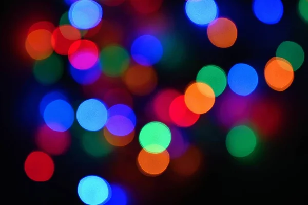 Mooie Kleurrijke Onscherpe Achtergrond Voor Kerstmis Gelukkig Nieuwjaar Abstract Bokeh — Stockfoto