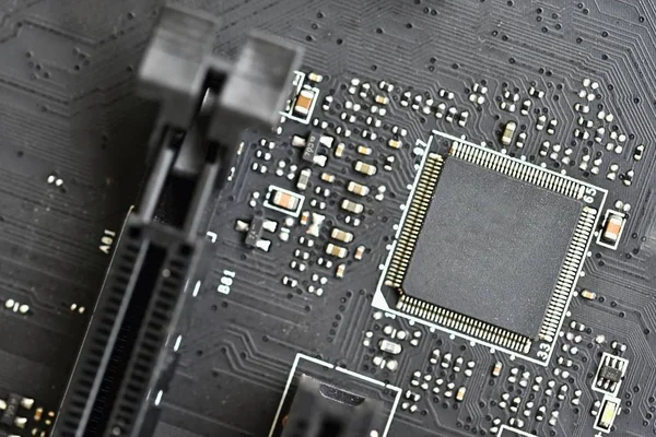 Printed Circuit Board with electrical components. Background concept for electrical engineering and modern technology