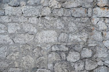 Gri taşlardan yapılmış taş duvar dokusu