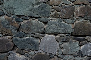 Gri taşlardan yapılmış taş duvar dokusu