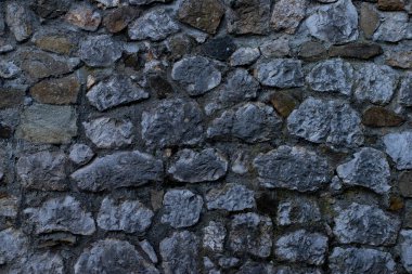Gri taşlardan yapılmış taş duvar dokusu