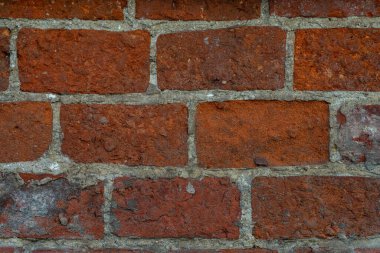 Güzel bir kırmızı tuğla işçiliğinin makro dokusu.