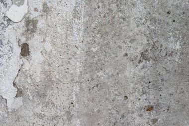 Beyaz beton bir duvarda soyulmuş boyanın makro dokusu.