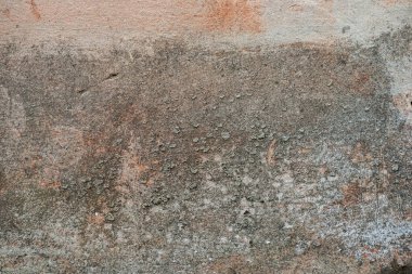 Beton duvar dokusu ve yakın plan boya dökülmesi.