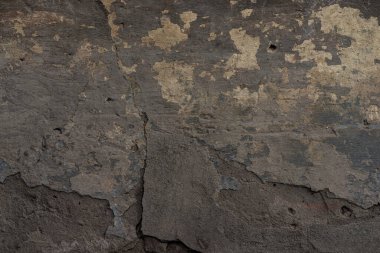 Beton duvar dokusu ve yakın plan boya dökülmesi.