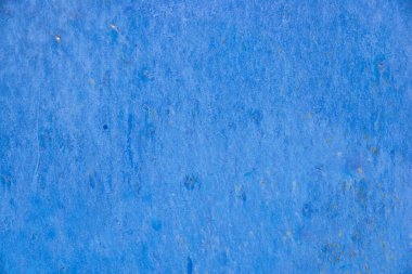 Eski, hırpalanmış, mavi beton duvarın dokusu