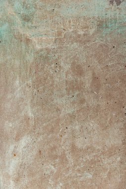 Beton duvar dokusunda bir sürü çatlak var.