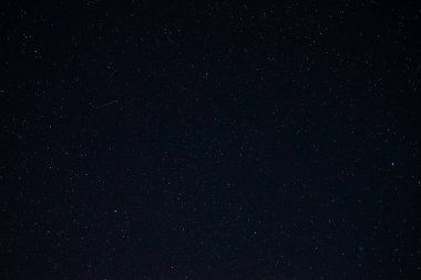 Gece gökyüzündeki yıldızlar Kapatın