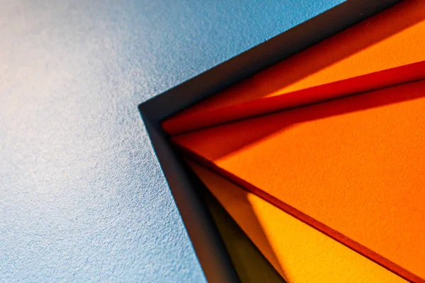 Abstract blue and orange panels closeup view