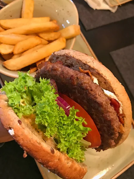 Closeup Tasty Hamburger Held Hand — Stock Photo, Image