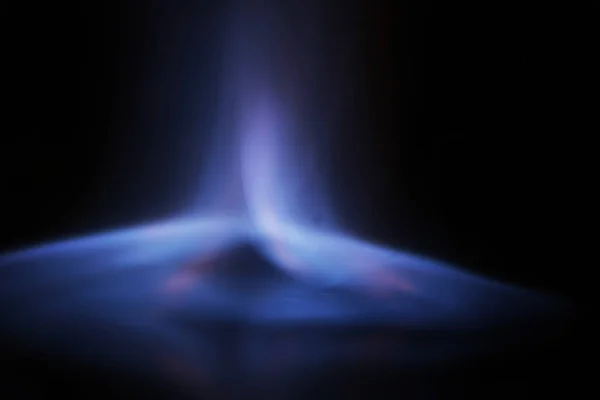 Closeup view of burning fire on dark background