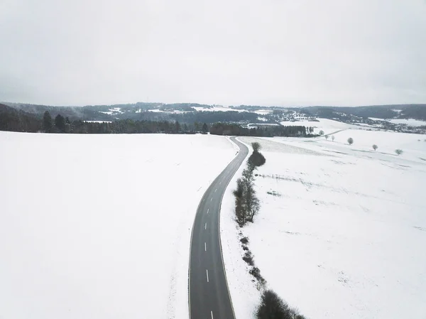 scenic view of winter landscape with road