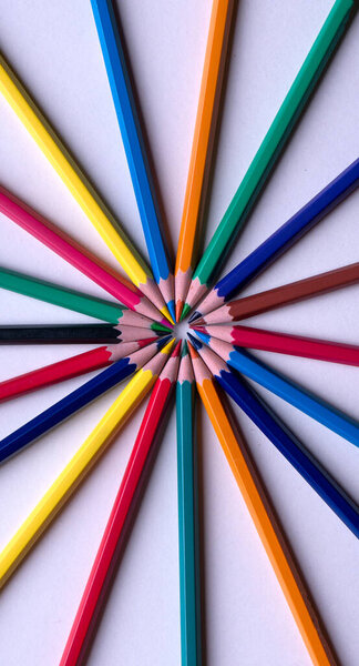 School supplies on blackboard background ready for your design. back to school. colourful crayons. colorful background