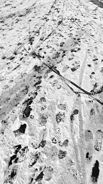 Texture Snow on Asphalt melts traces pavement