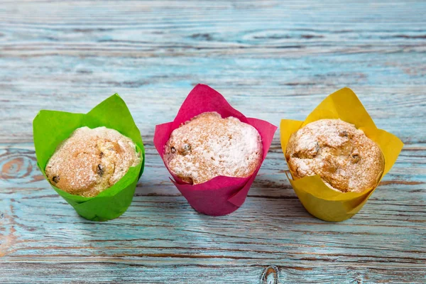 cupcakes on a blue wooden background