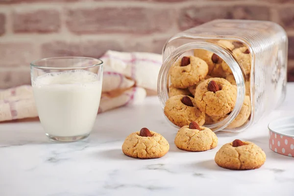 Turned Jar Dropped Out Almond Cookies Glass Milk — Stock Photo, Image