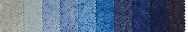Échantillons de tissus de coton colorés avec zig zag bord rangée organiser — Photo