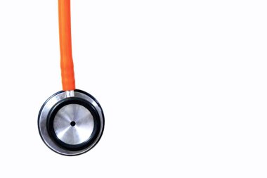 Turuncu stetoskop beyaz arka plan, yumuşak odak izole