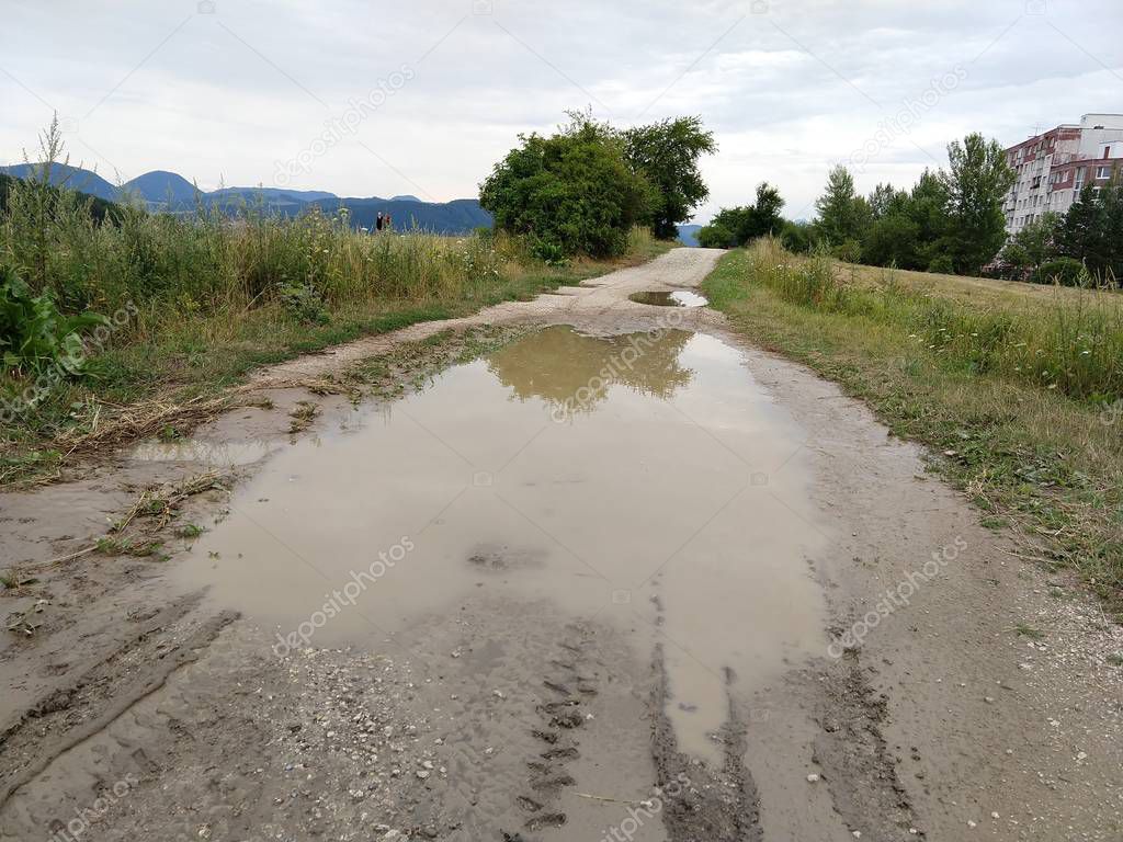 dirt road in steppe after rain