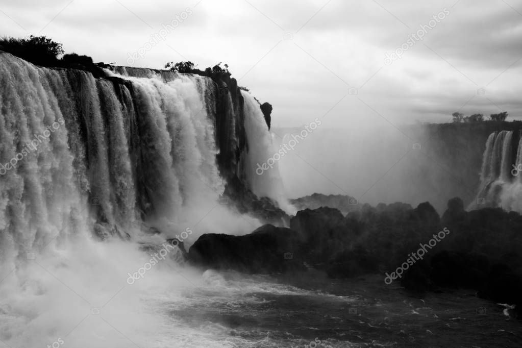 black and white photo of waterfall background