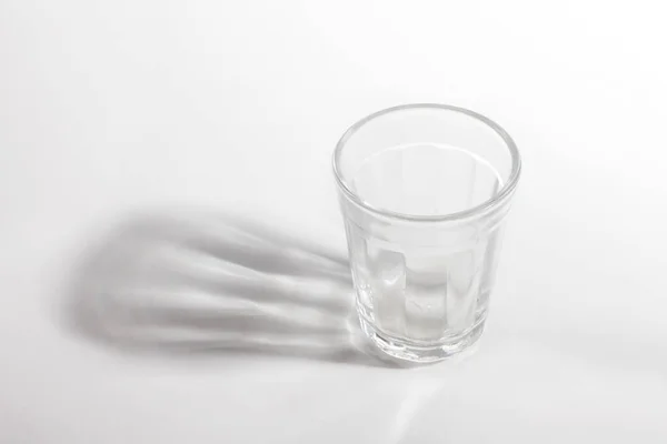 Close View Empty Glass Shadow Light Background — Stock Photo, Image