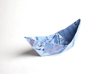 tekne şeklinde banknot, finansal kavram 