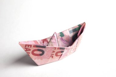tekne şeklinde banknot, finansal kavram 