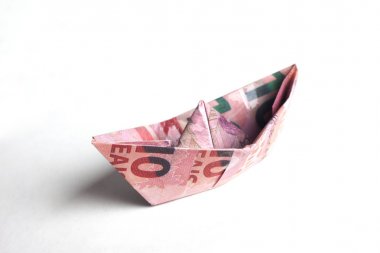 tekne şeklinde banknot, finansal kavram 