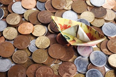 sikke arka plan, mali kavram üzerinde tekne şeklinde para banknot 