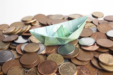 sikke arka plan, mali kavram üzerinde tekne şeklinde para banknot 