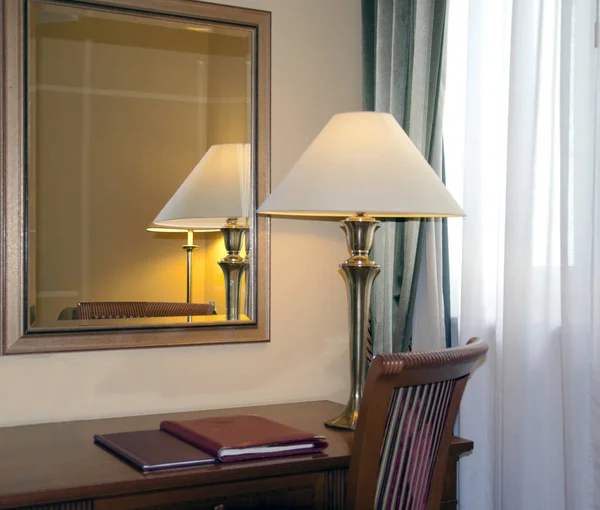 Hotel room with desk lamp