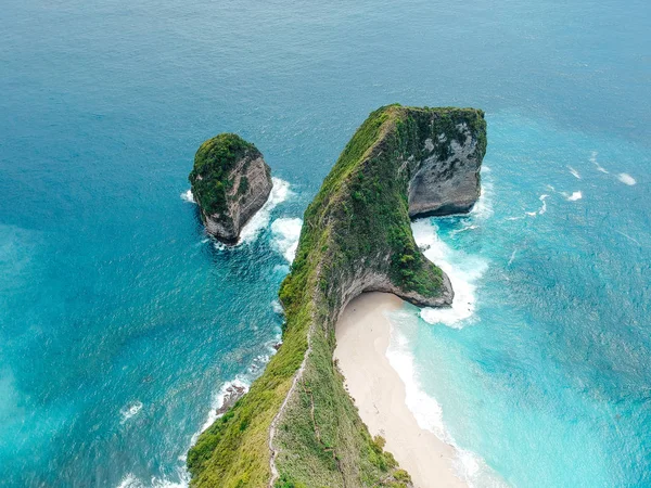 Aerial drone view of cliff, ocean, beach, shore In Nusa Penida, Bali, Indonesia with amazing blue ocean