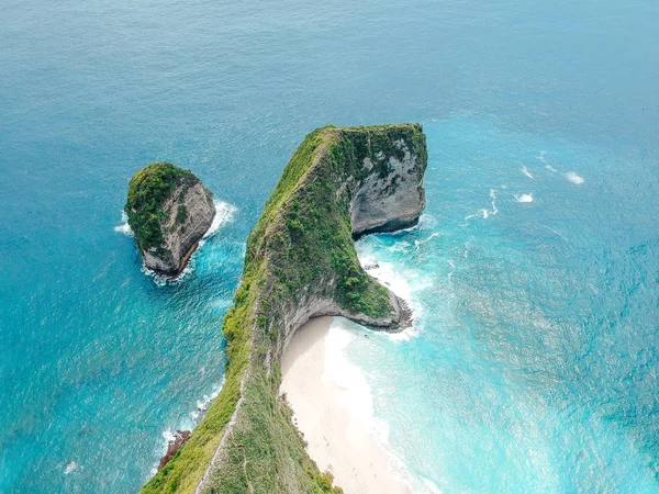Aerial drone view of cliff, ocean, beach, shore In Nusa Penida, Bali, Indonesia with amazing blue ocean
