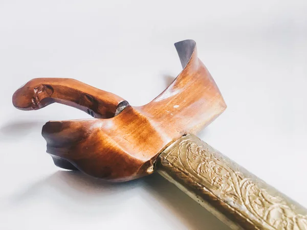 Antique typical Indonesian kris knife on white background