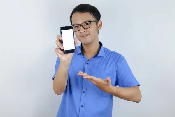 Young Asian Man Wear Blue Shirt Standing Smiling Pointing White — Stock Photo, Image