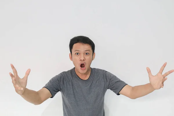 Eli Açık Asyalı Genç Bir Adamın Şok Olmuş Yüzü Reklam — Stok fotoğraf