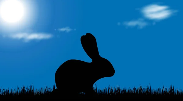 Silhouette Vectorielle Lapin Sur Une Prairie Soleil — Image vectorielle