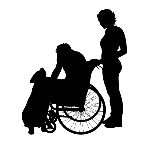白い背景に車椅子の男と家族のベクトル シルエット — ストックベクタ