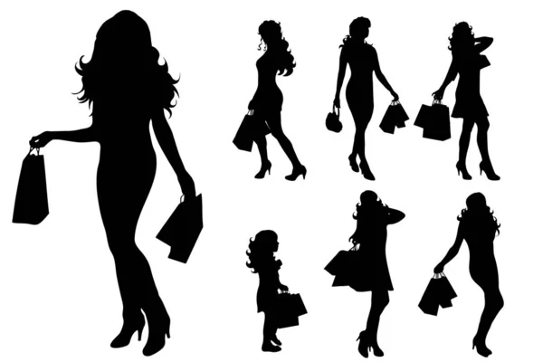 在白色背景购物的妇女的向量剪影 — 图库矢量图片