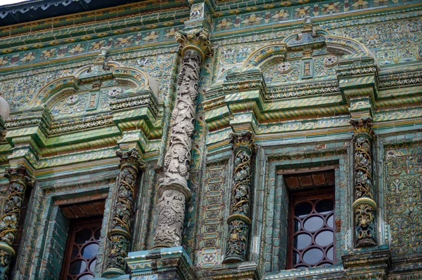 Faced on the outer facade with majolica tiles Teremok was built in the late 17th century by architect Larion Kovalev, tiles and carved columns made Osip Elders with their sons.