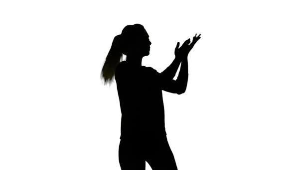 Isolated silhouette of dancing slim woman — Stock Video