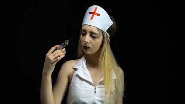 Sexy nurse with syrenge — Stock Video